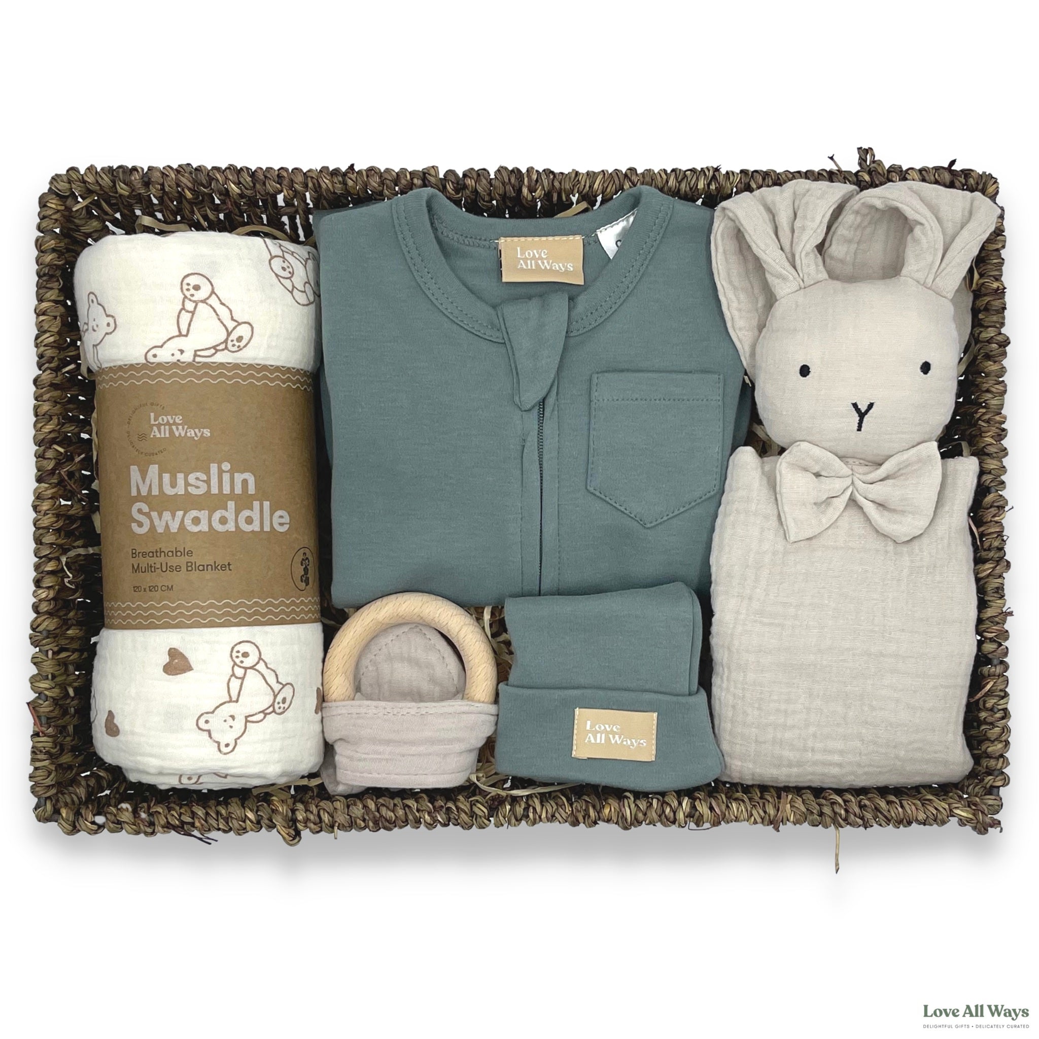This Organic Cotton Comfort Hamper delivers a message of celebration, affection and sense of ease. The premium organic products are natural, breathable and supremely comforting. The use of Greens with beige is a neutral classic that looks natural, this is safely delivered in our natural seagrass hamper