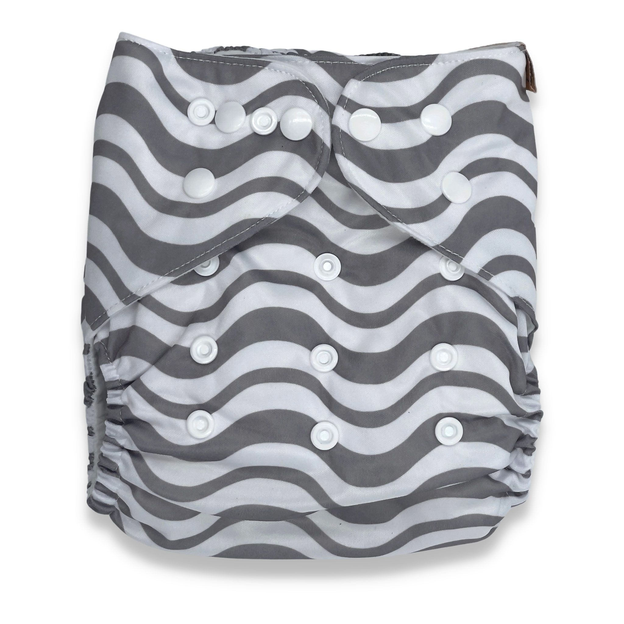 Our reusable modern cloth nappies are an eco friendly alternative, with an easy adjustable snap design, that offers flexible sizing to fit a growing baby. Suitable from new born all the way through to toilet training. The grey waves inspired outer shell is a water resistant PUL (polyurethane laminate) that reduces the use for extra cover. The inner moisture wicking suede cloth fabric ensures softness against the most delicate of skin and is naturally antibacterial